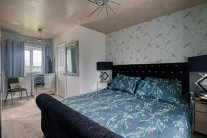 Bedroom One- click for photo gallery